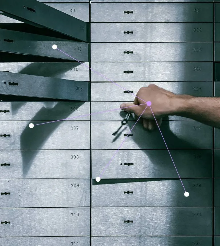 Hand opening a safe deposit box