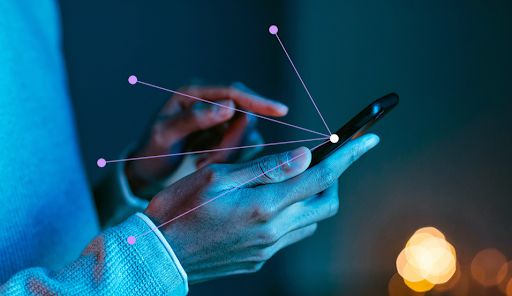 Hands using a tablet to review financial data